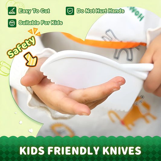A child holds the Onenazo Montessori Kitchen Tools (17 Pieces) kid-friendly, white plastic knife with a rounded edge—easy to cut, safe for hands, perfect for kids and Montessorisets.