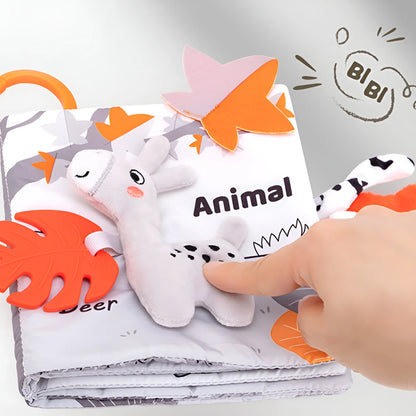Children's book with animal illustrations and a hand pointing to a page.