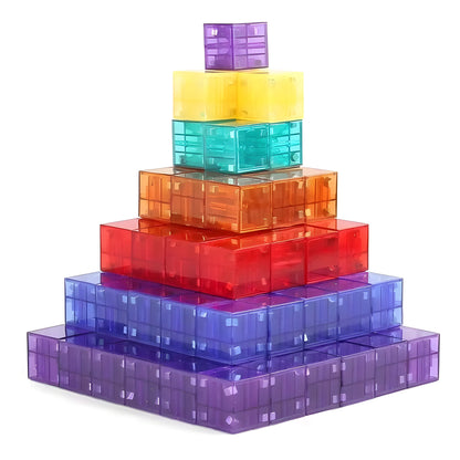 Stack of colorful transparent magnetic building blocks on a white background