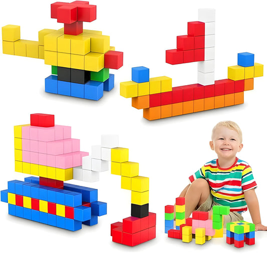 Colorful magnetic building blocks with a child playing with them on a white background