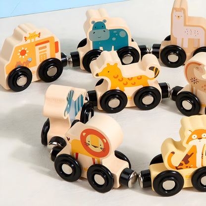 Set of magnetic wooden toy trains with animal designs on a white surface