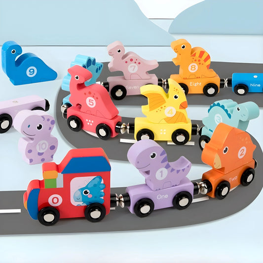 Colorful magnetic dinosaur toy train set on a track with a blue sky background