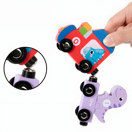 Colorful magnetic toy with wheels and a hand holding it, on a white background