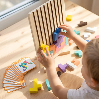Child playing with colorful wooden building blocks on a wooden table.