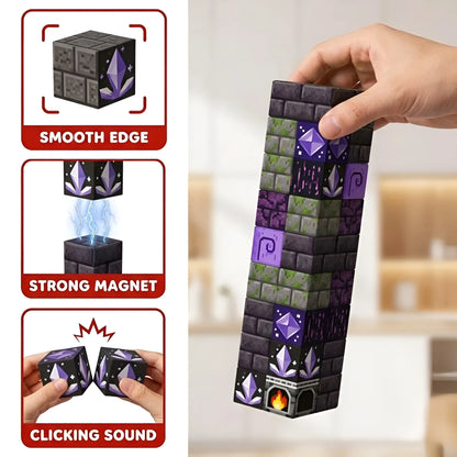 Stack of Cave themed Magnetic Building Blocks with purple crystal and mossy stone textures. A hand demonstrates the strong magnetic hold of the 2cm cubes with smooth edges.
