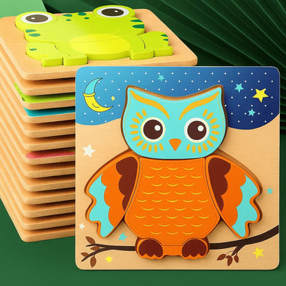 Wooden puzzle with owl design on a green background